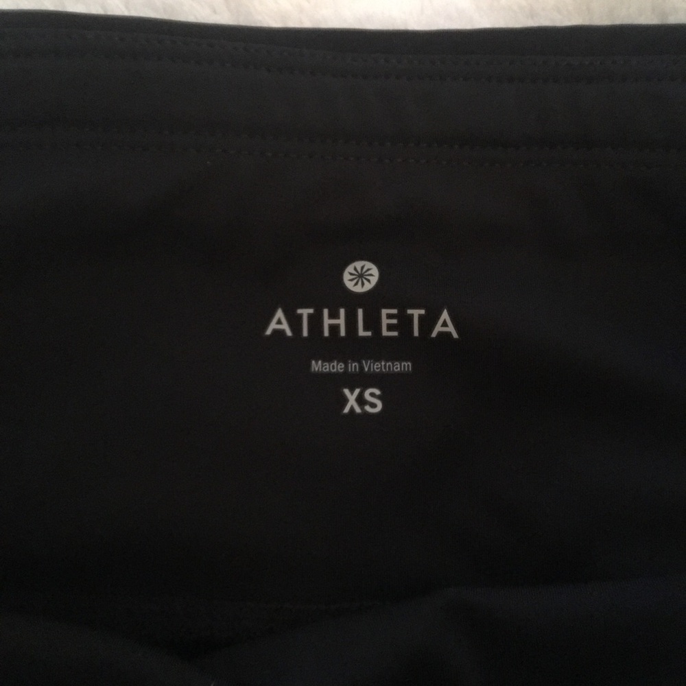 Laser cut Athleta Salutation tights